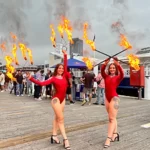 Red leotard fire rovers at redbull event heic